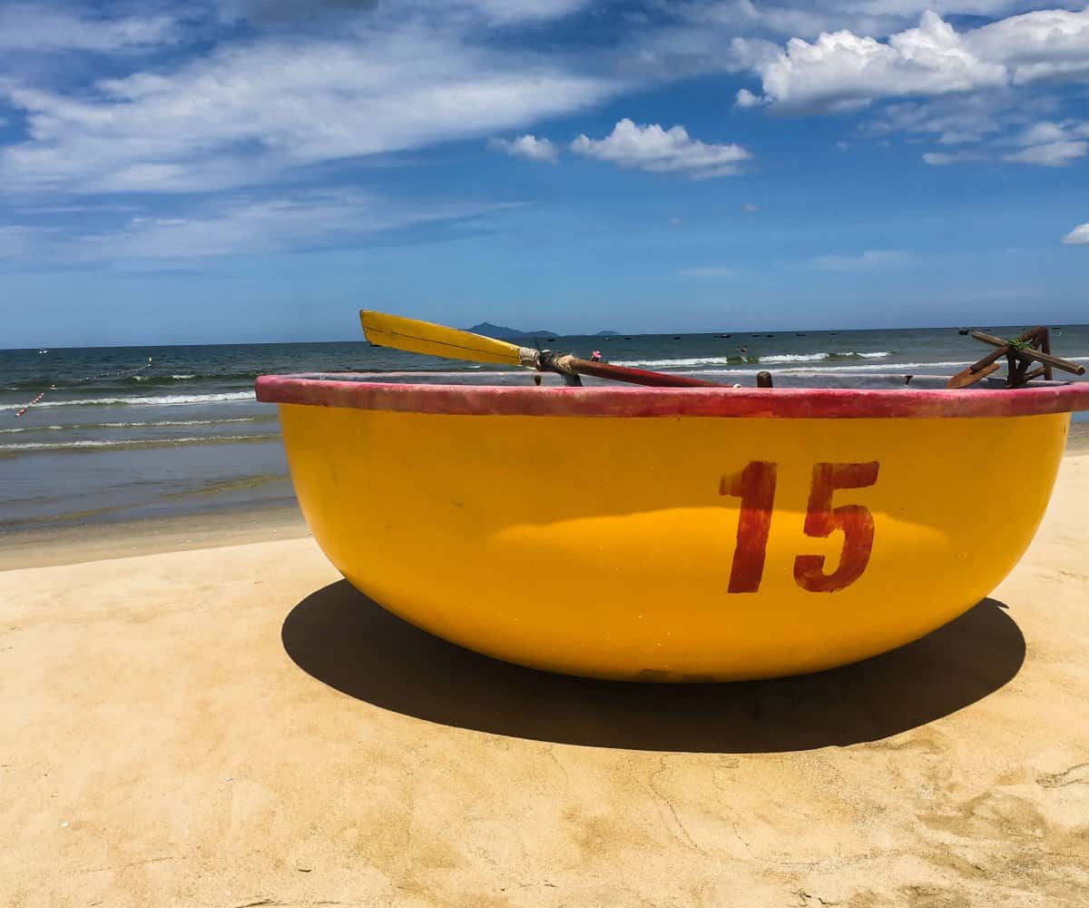 'Basket Boat' sitting on Pham Van Dong beach, Da Nang, Vietnam.