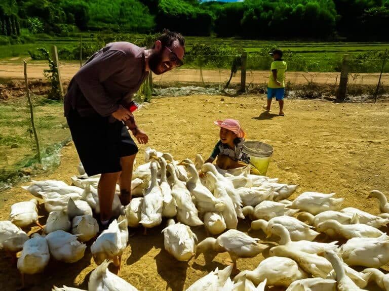 Ducks feeding at my ankles, The Duck Stop, Phong Nha