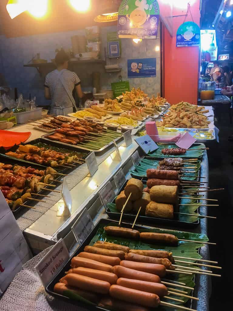 The night bazaar of Chiang Rai, one of the many food stalls, including Spicy Sausage, Thailand
