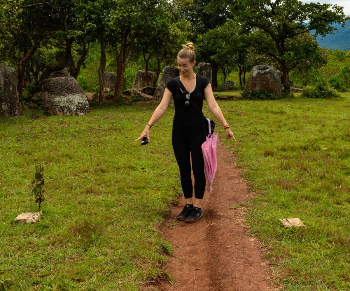My partner pointing out the MAG stones marking the safe path, Phonsavan, Laos.