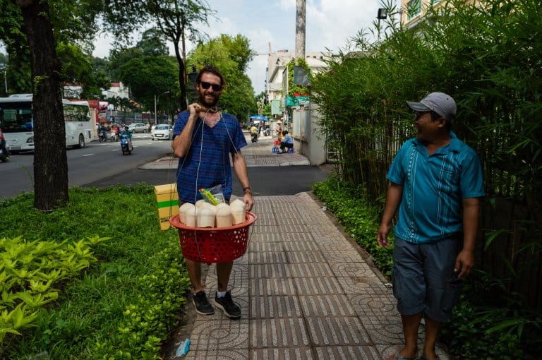 A local, very nice man offered an insight into his job selling coconuts in Ho Chi Minh, Vietnam. Then offered over-priced coconuts. My jetlagged brain fell for it! 