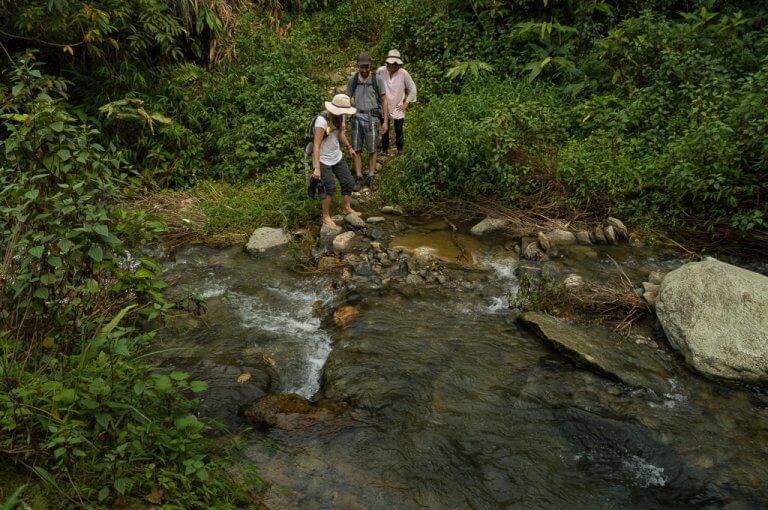 Crossing a river during the hike, near SaPa, Vietnam