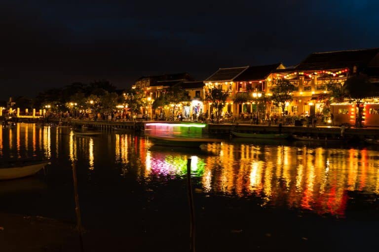  One of the best places to visit in Vietnam is Hoi An. A beautiful night time riverside in the ancient port town.