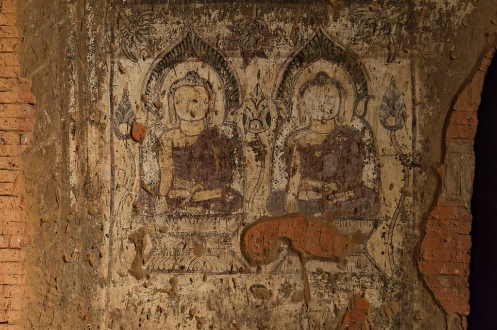 Buddhist images cover walls in Old Bagan, Myanmar