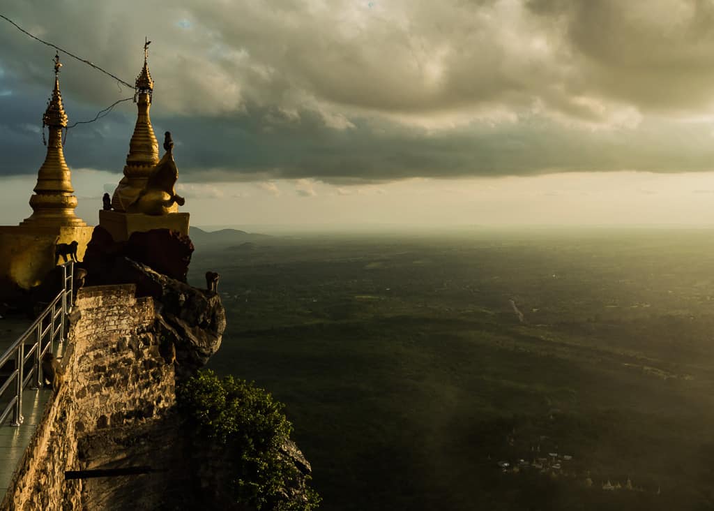 Monkeys climbing on stupas, Myanmar