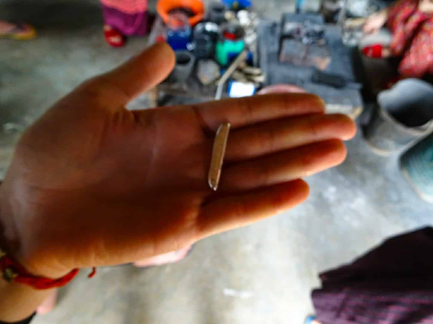 A sliver of silver, melted only seconds before, Inle Lake, Myanmar