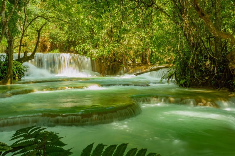 Kuang Si Waterfalls is located near the old capital of Luang Prabang in Laos