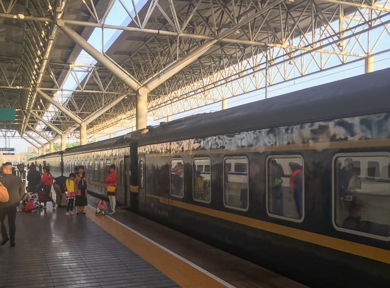 Boarding the train from Yichang to Zhangjiajie, China