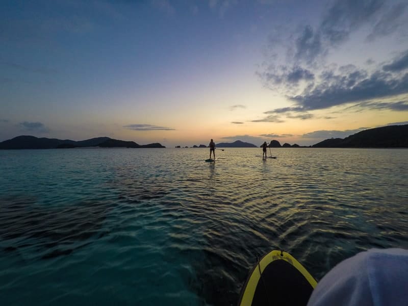 Sunset paddle boarding off the coast of Zamami Island
