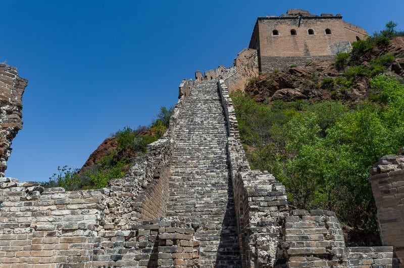 Uneven steps and loose ground are common once you get past the maintained section of Jinshanling Wall