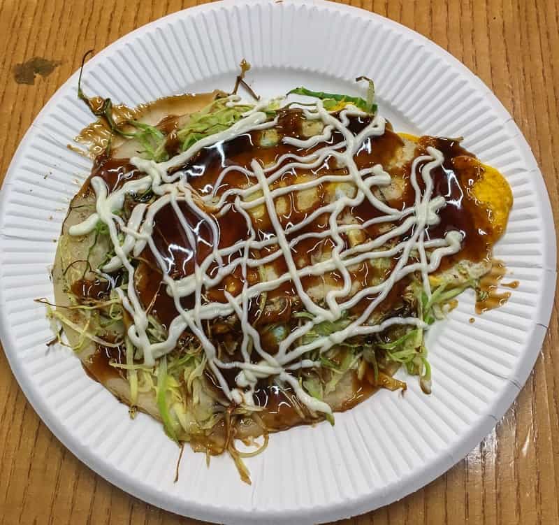 Fresh fish pancake of Okonomiyaki is Osaka's blend of this popular dish