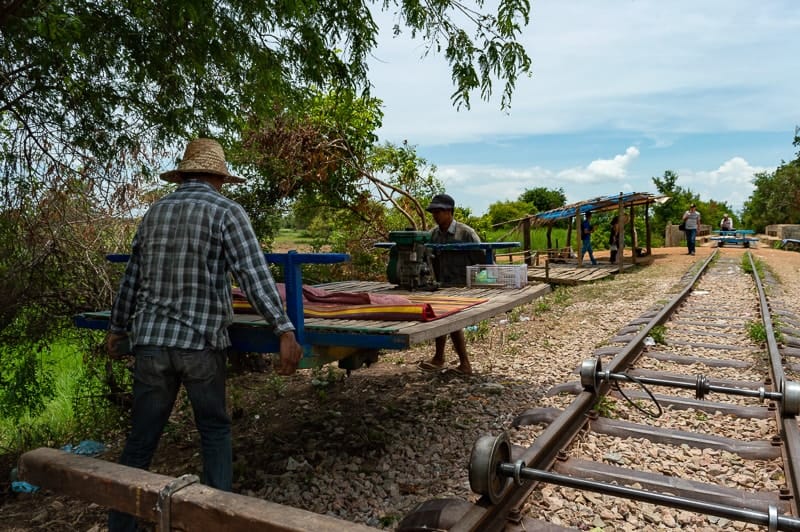 Bamboo Train drivers would deconstruct a train so others could pass on the single track in Battambang
