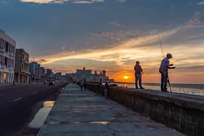 Havana sunset at break wall, Cuba